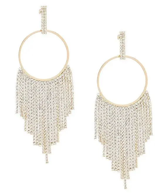 a pair of woven rattan straw wicker bohemian tassel earrings.